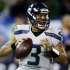 Seattle Seahawks quarterback Russell Wilson (3) passes against the Buffalo Bills during the first half of an NFL football game, Sunday, Dec. 16, 2012, in Toronto. (AP Photo/Mike Groll)