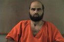 Nidal Hasan, charged with killing 13 people and wounding 31 in a November 2009 shooting spree at Fort Hood, Texas, is pictured in an undated Bell County Sheriff's Office photograph.
