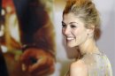 Actress Rosamund Pike smiles during a red carpet event for the film "Jack Reacher" in Tokyo