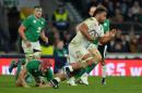 England's number 8 Billy Vunipola (R) runs with the ball during the Six Nations international rugby union match between England and Ireland at Twickenham in south west London on February 27, 2016
