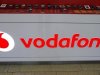 The Vodafone logo is seen at the counter of the shop in Prague