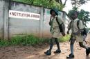 Students walk to school in Zimbabwe's capital Harare