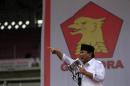 Subianto, presidential candidate from the Great Indonesia Movement (Gerindra) Party, delivers a speech to supporters during a campaign rally at a stadium in Jakarta