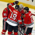 Chicago Blackhawks' Marian Hossa (81), Jonathan Toews (19) and Duncan Keith (2) congratulate goalie Ray Emery after they defeated the Los Angles Kings 3-2 on Sunday, Feb. 17, 2013, in Chicago. (AP Photo/John Smierciak)