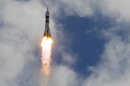 The Soyuz-FG rocket booster with Soyuz TMA-05M space ship carrying a new crew to the International Space Station, ISS, flies in the sky at the Russian leased Baikonur cosmodrome, Kazakhstan, Sunday, July 15, 2012. The Russian rocket carries Russian cosmonaut Yuri Malenchenko, U.S. astronaut Sunita Williams and Japanese astronaut Akihiko Hoshide. (AP Photo/Dmitry Lovetsky)