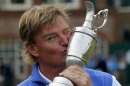 Ernie Els of South Africa kisses the Claret Jug after winning the British Open golf championship at Royal Lytham & St Annes