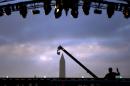 The Washington Monument is photographed through the stage on the National Mall in Washington, Tuesday, Nov. 11, 2014, before the start of the Concert for Valor. The Veterans Day event is hosted by HBO, Starbucks and Chase and is free and open to the public. (AP Photo/Carolyn Kaster)