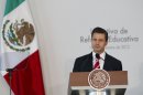 Mexico's President Enrique Pena Nieto delivers a speech during an event to announce an education reform proposal in Mexico City, Monday, Dec. 10, 2012. Pena Nieto is proposing sweeping reforms to the public education system widely seen as moribund, taking on Elba Esther Gordillo, an iron-fisted union leader who is considered the country's most powerful woman and the main obstacle to change. (AP Photo/Alexandre Meneghini)