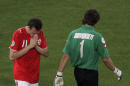 FILE - In this Monday, June 26, 2006 file photo, Switzerland's Marco Streller, left, reacts after missing a penalty kick against Ukraine's goalkeeper Oleksandr Shovkovskyi, during their World Cup second round soccer match, in Cologne, Germany. Ukraine won 3-0 in a penalty shootout. On this day: Switzerland became the first team in the history of World Cup shoot-outs not to score a single spot kick, and the first team ever to depart a World Cup without conceding a goal in normal play. (AP Photo/Martin Meissner, File)