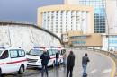 Libyan security forces and emergency services surround Tripoli's central Corinthia Hotel on January 27, 2015