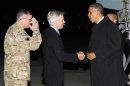 U.S. President Obama shakes hands with U.S. Ambassador to Afghanistan Crocker upon his arrival at Bagram Air Base in Kabul