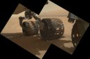 This image provided by NASA shows the Curiosity rover's three left wheels. Since landing on Mars on Aug. 5, 2012, Curiosity has driven more than the length of a football field. It will resume driving this week after it completes its health checkups. (AP Photo/NASA)