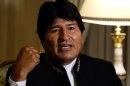 Bolivia's President Evo Morales speaks during an interview with journalists at the presidential residence in La Paz
