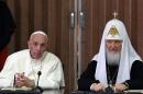 Pope Francis (L) and the head of the Russian Orthodox Church, Patriarch Kirill (R), deliver a joint press conference during a historic meeting in Havana on February 12, 2016