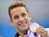 Chad Le Clos (shown with his gold medal) said he would try to make the dance