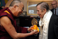 FILE - in this Dec. 10 2011 file photo Tibetan spiritual leader the Dalai Lama, left, hands a present to Czech ex-president Vaclav Havel, right, during their meeting in Prague, Saturday, Dec. 10, 2011. Havel, the dissident playwright
 who wove theater into politics to peacefully bring down communism in

 Czechoslovakia and become a hero of the epic struggle that ended the Cold War, died Sunday Dec. 18, 2011 in Prague. He was 75. (AP Photo,CTK/Katerina Sulova) SLOVAKIA OUT