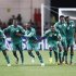 Nigeria team players celebrate winning their Africa Nations Cup quarter finals match against Zambia on a penalty shoot out in Lubango