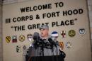 FILE - In this April 2, 2014 file photo, Lt. Gen. Mark Milley, commanding general of III Corps and Fort Hood, speaks with the media outside of an entrance to the Fort Hood military base following a shooting that occurred inside, in Fort Hood, Texas. Fort Hood did not have a system in place that could have anticipated a deadly rampage last April that left four soldiers dead and 16 wounded, according to a U.S. Army report released Friday, Jan. 23, 2015. (AP Photo/Tamir Kalifa, File)
