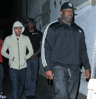 Chris Brown's Bodyguard Suing Drake For Causing 'Riot And Disorder' During Club Brawl