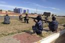 Iraqi security forces take their positions during clashes with al Qaeda-linked Islamic State of Iraq and the Levant (ISIL) in the city of Ramadi