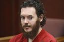 In this June 4, 2013 file photo, Aurora theater shooting suspect James Holmes is seated in court in Centennial, Colo. Jury selection in the Colorado theater shooting case enters its final stage Monday, April 13, 2015 when attorneys begin questioning prospective jurors as a large group. Prosecutors and defense attorneys will whittle 115 remaining candidates down to 12 jurors and 12 alternates serve in the months-long trial of Holmes. Opening statements are scheduled for April 27. (Andy Cross,/Pool Photo via AP, File)