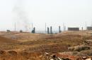 A view of an oil refinery in the Iraqi city of Kirkuk, on June 20, 2014