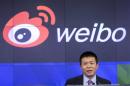 Weibo Corporation Chairman Charles Chao speaks during a visit to the NASDAQ MarketSite in Times Square in celebration of Weibo's initial public offering (IPO) on The NASDAQ Stock Market in New York