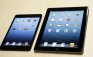 The iPad mini, left, is shown next to the 4th generation iPad (AP/Marcio Jose Sanchez)