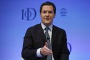 Britain's Chancellor of the Exchequer George Osborne speaks at the Institute of Directors annual convention in London