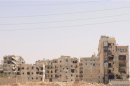 Damaged buildings are seen at Saladin neighbourhood after clashes between Free Syrian Army fighters and forces loyal to President Bashar al-Assad in Aleppo city