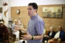 Republican presidential candidate, Wisconsin Gov. Scott Walker speaks during a meet and greet with local residents, Thursday, Aug. 27, 2015, in Greenfield, Iowa. (AP Photo/Charlie Neibergall)