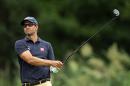 Adam Scott, of Australia, watches his tee shot on the fifth hole during second round play at The Barclays golf tournament Friday, Aug. 22, 2014, in Paramus, N.J. (AP Photo/Adam Hunger)