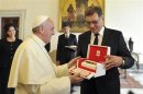 Pope Francis exchanges gifts with Prime Minister of Lithuania Butkevicius during private audience at the Vatican