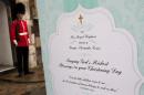 A giant Christening card is pictured on October 22, 2013 outside the Chapel Royal in St James's Palace, where Prince George of Cambridge will be baptised