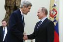 Russian President Putin welcomes U.S. Secretary of State Kerry during meeting at Kremlin in Moscow