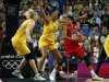 Parker of the U.S. is guarded by Australia's Cambage and Jackson during their women's basketball semifinal match at the North Greenwich Arena during the London 2012 Olympic Games