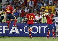 Spain's Jordi Alba celebrates their second goal with teammates during the Euro 2012 soccer championship final against Italy in Kiev, Ukraine, Sunday, July 1, 2012. (AP Photo/Matthias Schrader)