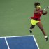 Williams of the U.S. hits a return to Errani of Italy during their women's semifinals match at the U.S. Open tennis tournament in New York