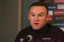 England captain and striker Wayne Rooney gives a press conference at a hotel near Watford, north of London, on November 16, 2015, ahead of their international friendly football match against France at Wembley Stadium on November 17
