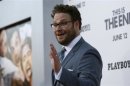 Rogen waves at the premiere of "This Is the End" at the Regency Village Theatre in Los Angeles