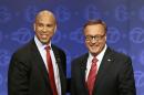 Democratic Newark Mayor Cory Booker, left, and Republican Steve Lonegan stand together after their first debate in the U.S. Senate campaign on Friday, Oct. 4, 2013, in Trenton, N.J. The two squared off in the first debate of the campaign with just 12 days to go before the special Senate election. (AP Photo/Mel Evans)