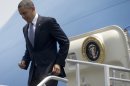 President Barack Obama leaves Air Force One upon his arrival at Benito Juarez International Airport in Mexico City, Thursday, May 2, 2013. Obama is traveling on a three-day trip to Mexico an Costa Rica. (AP Photo/Pablo Martinez Monsivais)