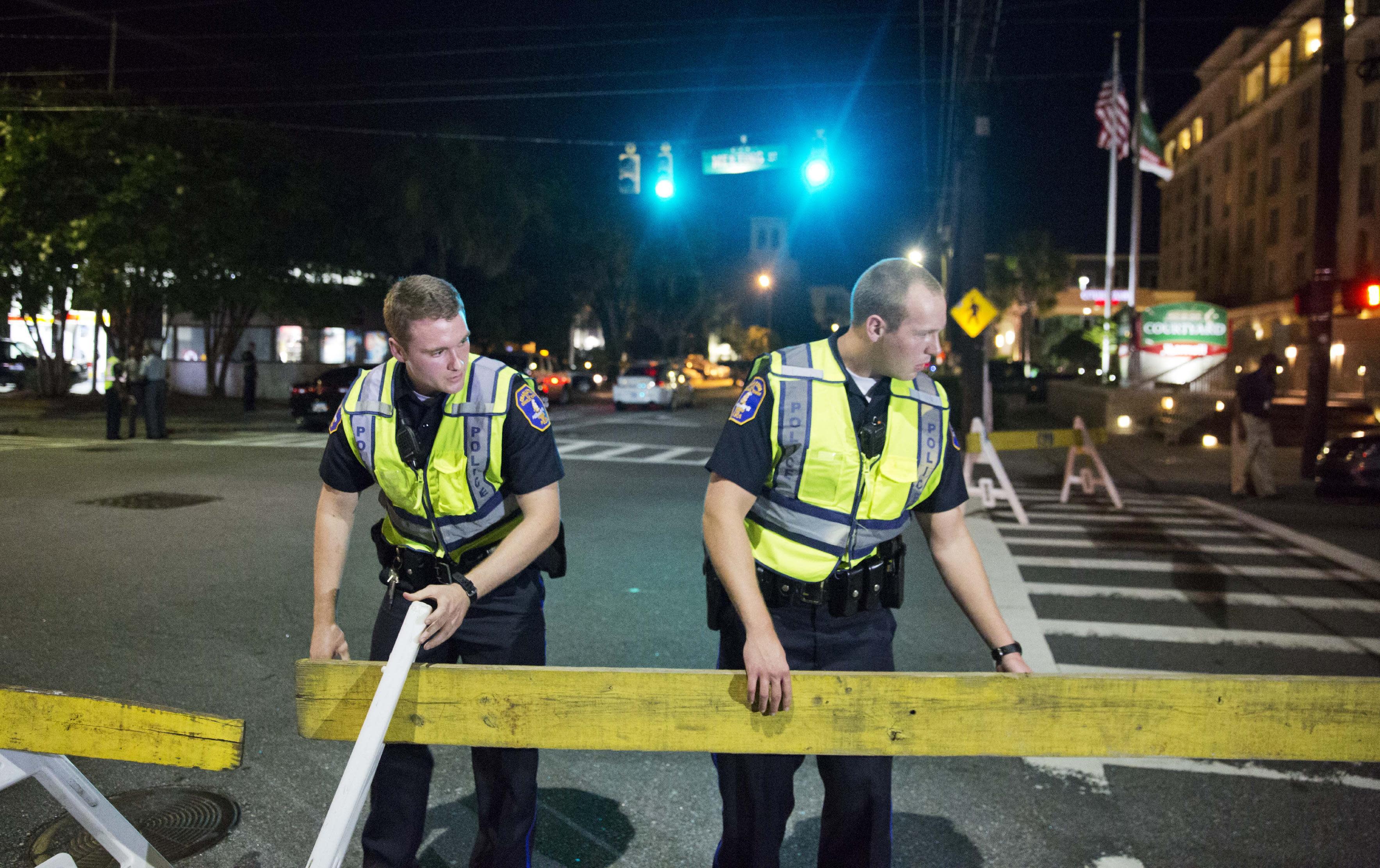 Gunman on run after nine killed in Charleston church shooting.