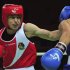 Taylor throws a punch at Khassenova during their women's 60 kg division match at the AIBA World Women's Boxing Championships in Qinhuangdao