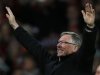 Manchester United's manager Ferguson celebrates after his team clinched the English Premier League soccer title with a win against Aston Villa at Old Trafford in Manchester