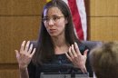 Jodi Arias gestures toward the jury, Tuesday, March 5, 2013, in Maricopa County Superior Court in downtown Phoenix. Arias is on trial for the murder of Travis Alexander in 2008. (AP Photo/The Arizona Republic,Tom Tingle, Pool)