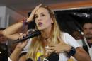 Lilian Tintori, wife of jailed opposition leader Leopoldo Lopez, speaks during a news conference in Caracas