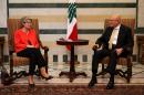 The chief of the U.N.'s education and culture agency, Irina Bokova of Bulgaria, left, meets with Lebanese Prime Minister Tammam Salam, right, at the government palace in Beirut, Lebanon, Friday, May 15, 2015. Bokova is in Lebanon to meet with Lebanese senior officials and students, and pledge UNESCO's support to the country's efforts to respond to the regional crisis and foster cultural diversity. (AP Photo/Hussein Malla)