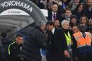 Chelsea's head coach Antonio Conte (R) shakes hands with Manchester United's manager Jose Mourinho after the final whistle at Stamford Bridge in London on October 23, 2016