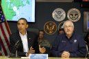 President Barack Obama speaks as he attends a briefing with Federal Emergency Management Agency administrator Craig Fugate, right, at the National Response Coordination Center at FEMA Headquarters in Washington, Sunday, Oct. 28, 2012.(AP Photo/Jacquelyn Martin)